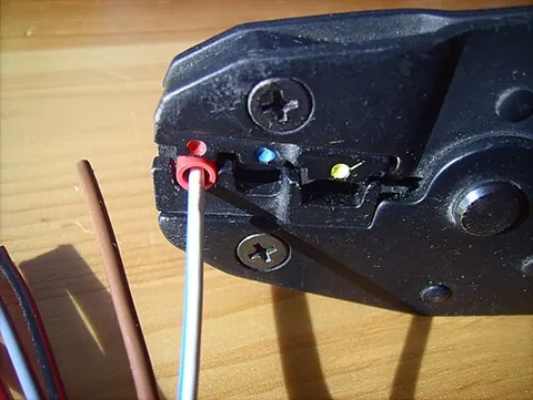 crimping tool: a tool used to crimp, to join two pieces of metal