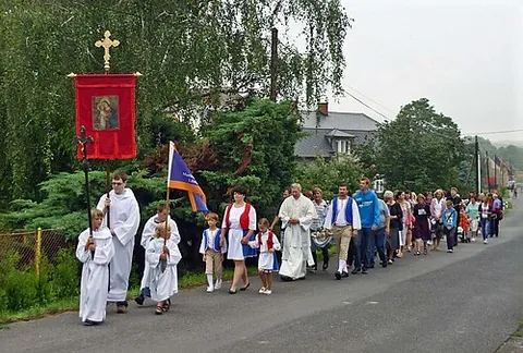 cross bearer: a person who carries a cross in a Christian religious procession