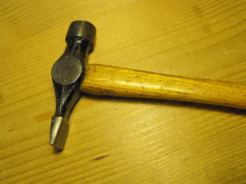 cross peen hammer: a hammer with a blade-like peen at right angles to the haft, used by carpenters
