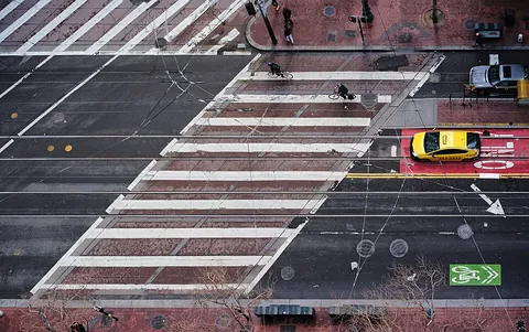 crosswalk: a point designated for pedestrians to cross a street
