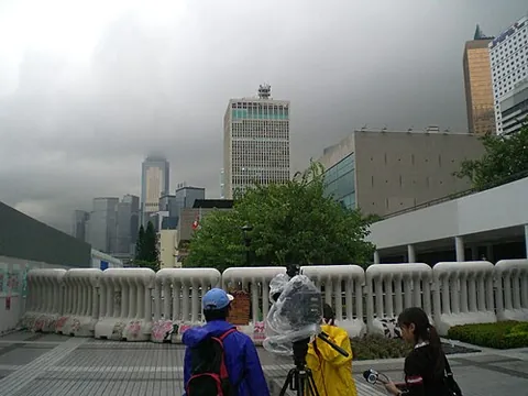 crowd control barrier: a barricade erected at a public event, such as a rally or festival, to prevent people from entering...