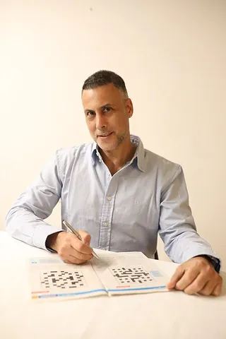 cruciverbalist: a person who constructs or solves crosswords