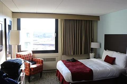cuck chair: a chair, especially one in a hotel room, that faces the bed; a corner chair