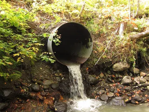 culvert: a channel crossing under a road or railway for the draining of water