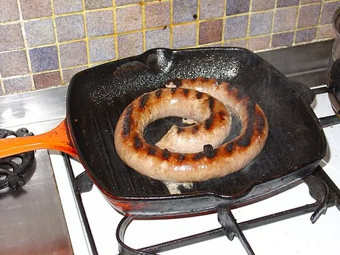 cumberland sausage: a traditional long English sausage made from chopped pork with pepper and herbs