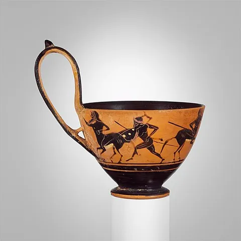 cup-shaped: having the hollow form of a cup (but without the handle)