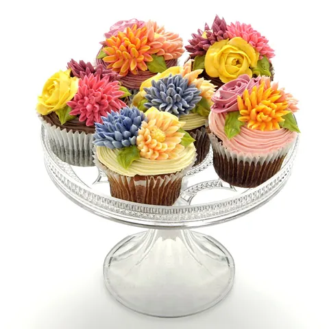 cupcake: a small cake baked in a usually paper container shaped like a cup, often with icing on top