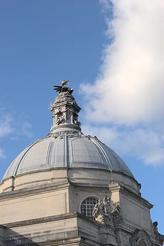 cupola: a dome-shaped ornamental structure located on top of a larger roof or dome