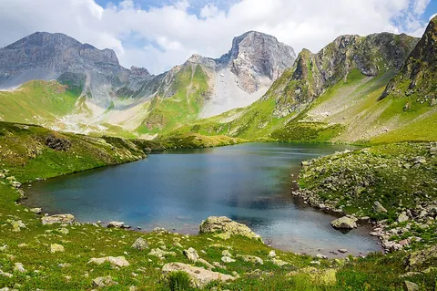 cwm: a valley head created through glacial erosion and with a shape similar to an amphitheatre