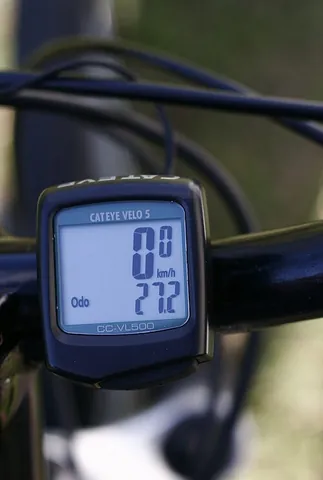 cyclocomputer: a device, designed to be mounted on the handlebar of a bicycle, that displays trip information