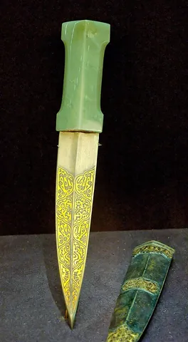 dagger: a stabbing weapon, similar to a sword but with a short, double-edged blade