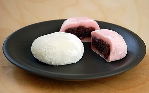 daifuku: a Japanese dessert consisting of a large mochi stuffed with red bean paste