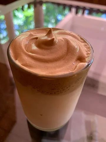 dalgona coffee: a coffee beverage made using whipped dalgona-flavored coffee cream and milk