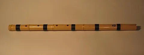 danso: a small notched, end-blown vertical flute made of bamboo or plastic, used in Korean music
