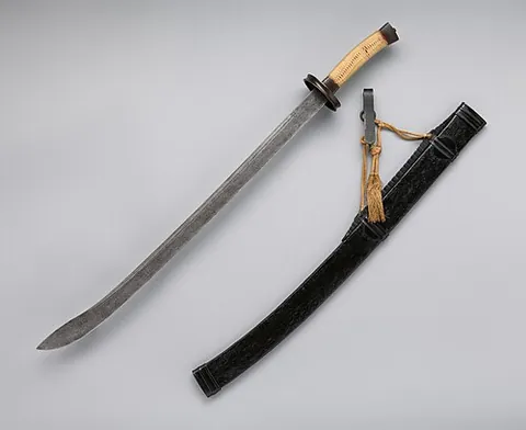 dao: any of various traditional Chinese swords with a curved, single-edged blade, primarily used for...