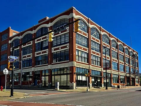 daylight factory: a factory of a particular architectural style, having a concrete frame and floor-to-ceiling...