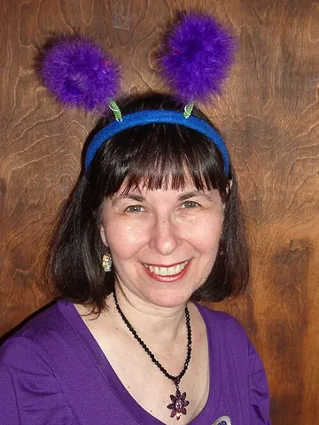 deely bobber: a novelty headband, popular in the 1980s, with two springy antenna-like protrusions topped with...