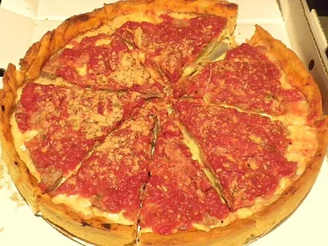 deep-dish pizza: synonym of Chicago-style pizza (“a pizza casserole on a bread base”)