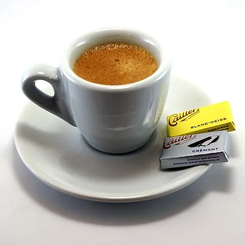 demitasse: a small cup of strong black coffee
