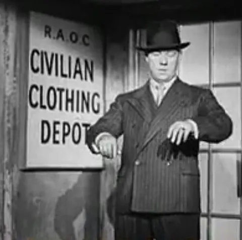 demob suit: a suit of civilian clothes issued to a soldier upon demobilization, especially at the end of World...