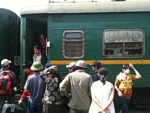 detrain: to exit from a train; to disembark