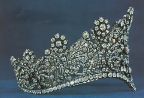 diadem: an ornamental headband worn as a badge of royalty