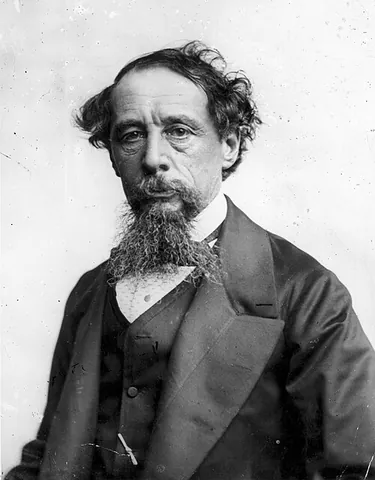 dickensian: of, pertaining to, or created by the English author Charles Dickens