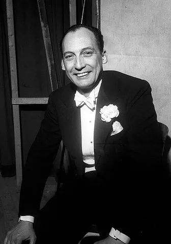 dinner jacket: a jacket, often white, corresponding to a tuxedo jacket