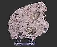 diogenite: an achondritic stony meteorite originating from deep within the crust of the asteroid 4 Vesta