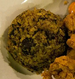 dirty rice: a traditional Cajun dish made from white rice cooked with small pieces of chicken liver or giblets