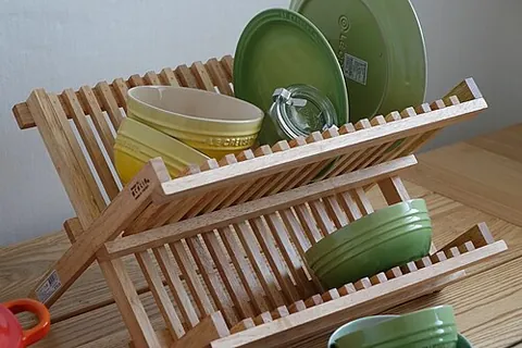 dish rack: a perforated rack on which washed dishes, etc. may be placed in order to dry