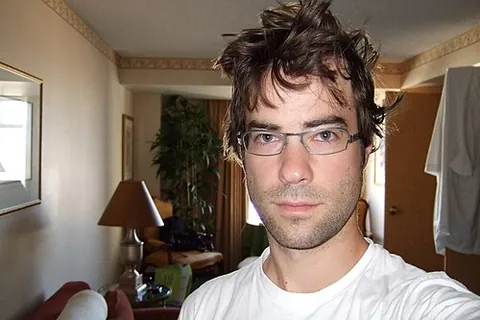 dishevelled: of a person, with the hair uncombed