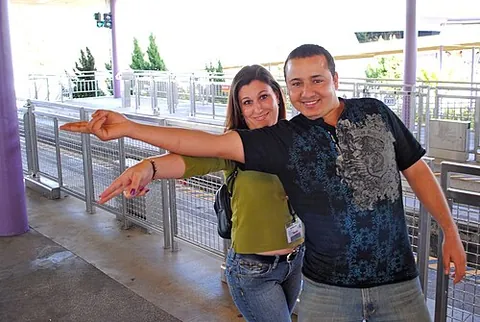 disney point: the act of pointing with the index and middle finger, used by staff at Walt Disney resorts when...