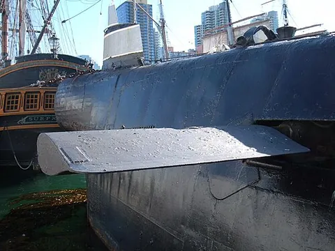 diving plane: a moveable control surface on a submarine, used to control the depth and pitch of the submarine