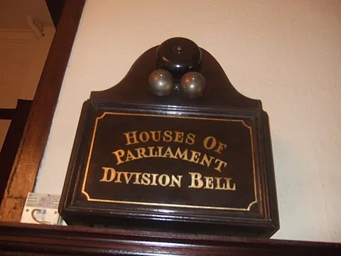 division bell: a bell rung in or around a parliament to signal a division (vote) to members of the relevant...
