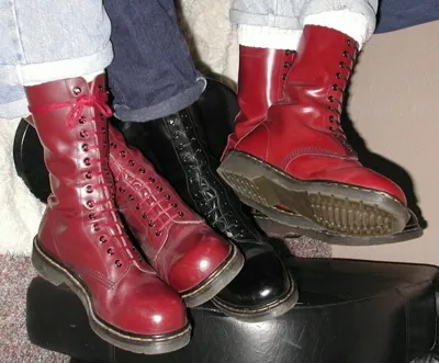 doc martens: dr. Martens-brand footwear, especially a style of high lace-up leather boot with air-cushioned...