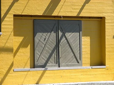 dock door: a door designed for loading and unloading goods in a warehouse etc