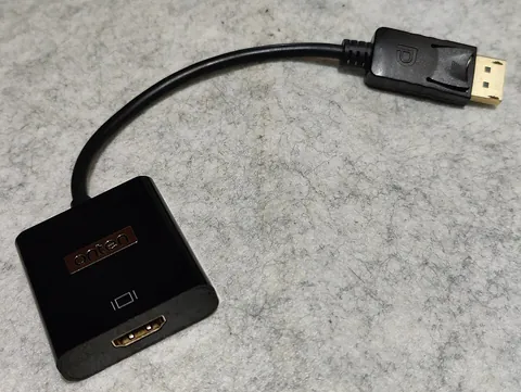 dongle: any small device that plugs into an electronic device, typically a computer, and alters its...