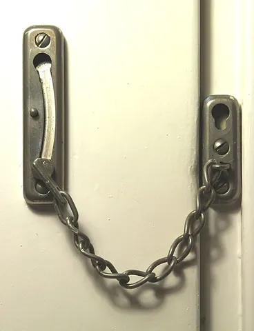 door chain: a device that allows a door to be partially opened from the inside, whilst preventing it from being...