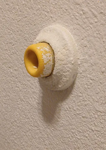 doorstop: any device or object used to halt the motion of a door, as a large or heavy object, a wedge, or...