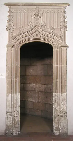 doorway: the passage of a door; a door-shaped entrance into a house or a room