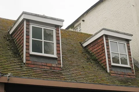 dormer-window: an upright window built from a sloping roof
