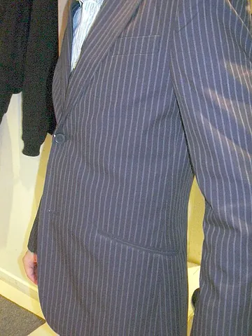 double besom pocket: a pocket on the inside of a garment accessed through a slit with a reinforced upper and lower...