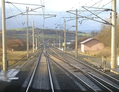 double crossover: two pairs of railway switches forming two connections that cross over between two parallel tracks