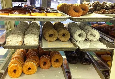 doughnut: a deep-fried piece of dough or batter, usually mixed with various sweeteners and flavors, often...