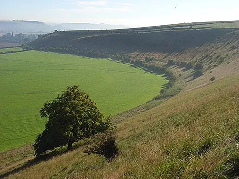 downland: an area of rolling hills (downs), often grassy pasture over chalk or limestone