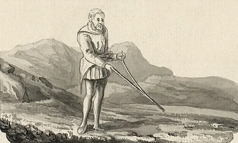 dowser: a divining rod used in searching for water, ore, etc.; a dowsing rod