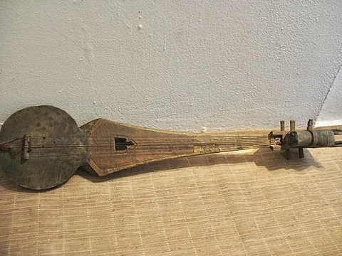 dramyin: a traditional unfretted long-necked plucked lute used in the Himalayan region