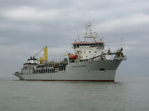 dredger: a vessel equipped for the removal of sand or sediment from the seabed