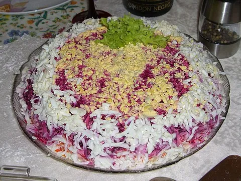 dressed herring: a layered salad composed of diced salted herring covered with layers of boiled egg, vegetables, and...